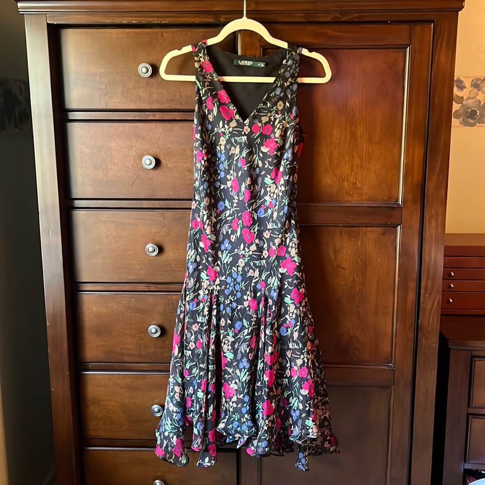 Sleeveless floral dress. Never worn, excellent preowned condition.